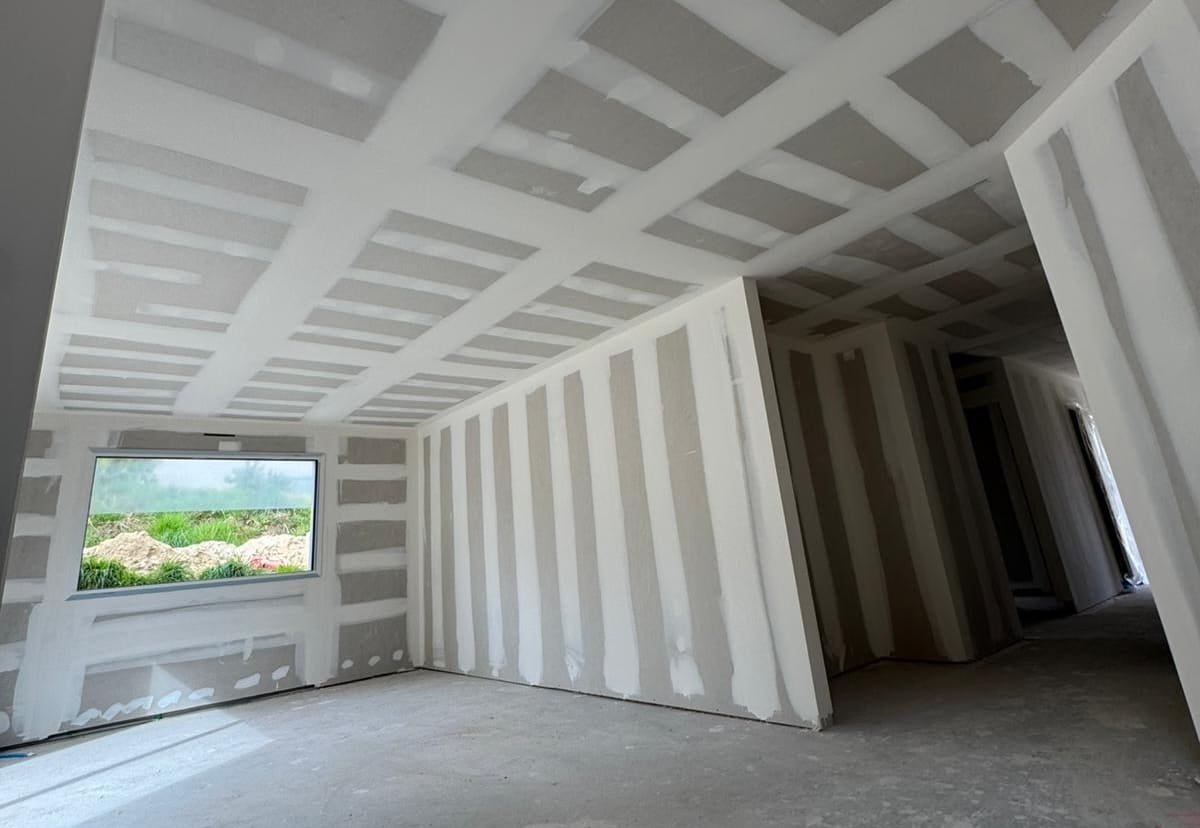 Pose de plaques de plâtre et bandes